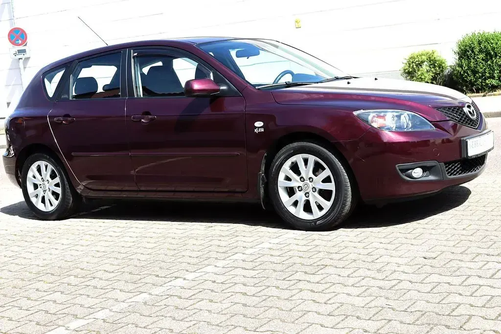 Używany Mazda 3 Active 105 KM (77 kW) 2007 Purpurowy Sedan/Limuzyna