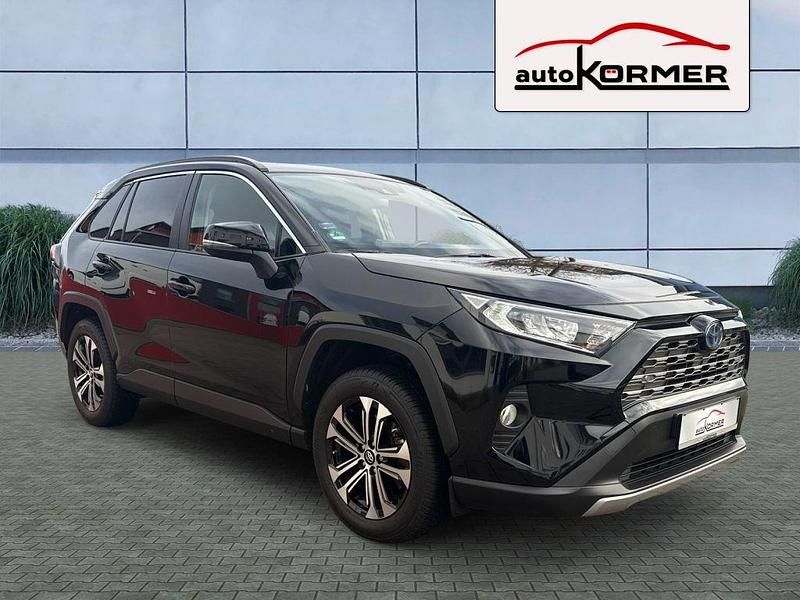 Tiefschwarz metallic Gebraucht 2020 Toyota RAV4 Hybrid Business Edition SUV | 29.880 € (Fairer Preis) - Bild 1/4