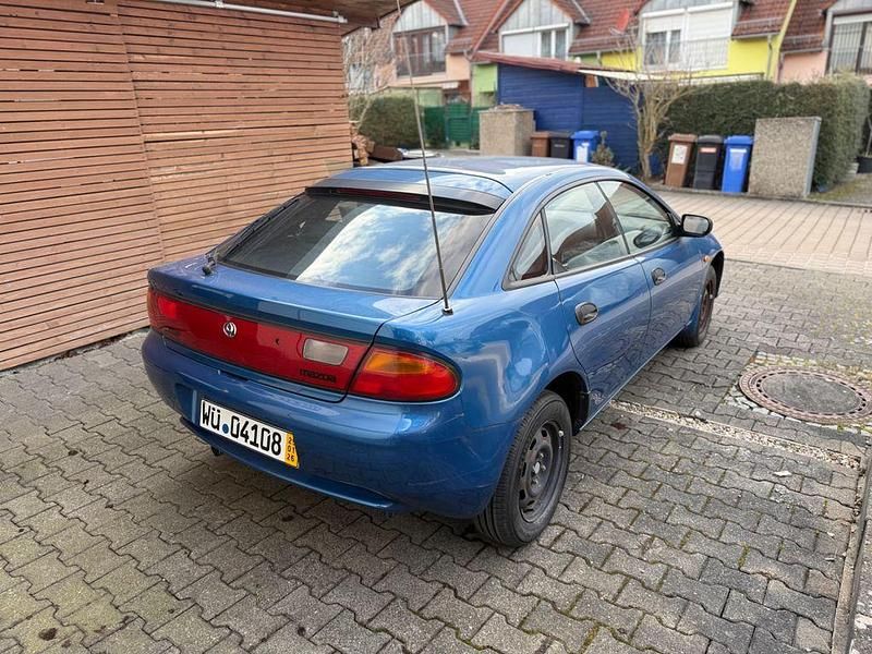 Gebraucht Mazda 323F 88 PS (64 kW) 1997 Blau Limousine