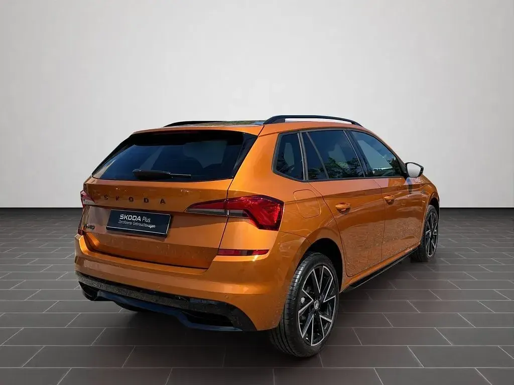 Gebraucht Skoda Kamiq Monte Carlo 150 PS (110 kW) 2023 Phoenixorange premium metallic (metallic) SUV