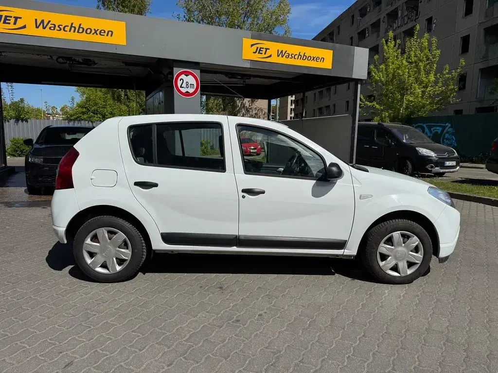 Second-hand Dacia Sandero 75 CP (55 kW) 2012 Alb Berlinǎ