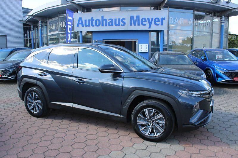 Dark knight grau (metallic) Gebraucht 2023 Hyundai Tucson SUV | 27.710 € (Guter Preis) - Bild 1/4