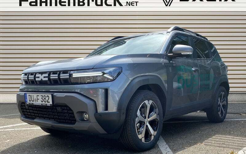 Dolomitgrau Gebraucht 2024 Dacia Duster Journey SUV | 27.855 € (Fairer Preis) - Bild 1/4