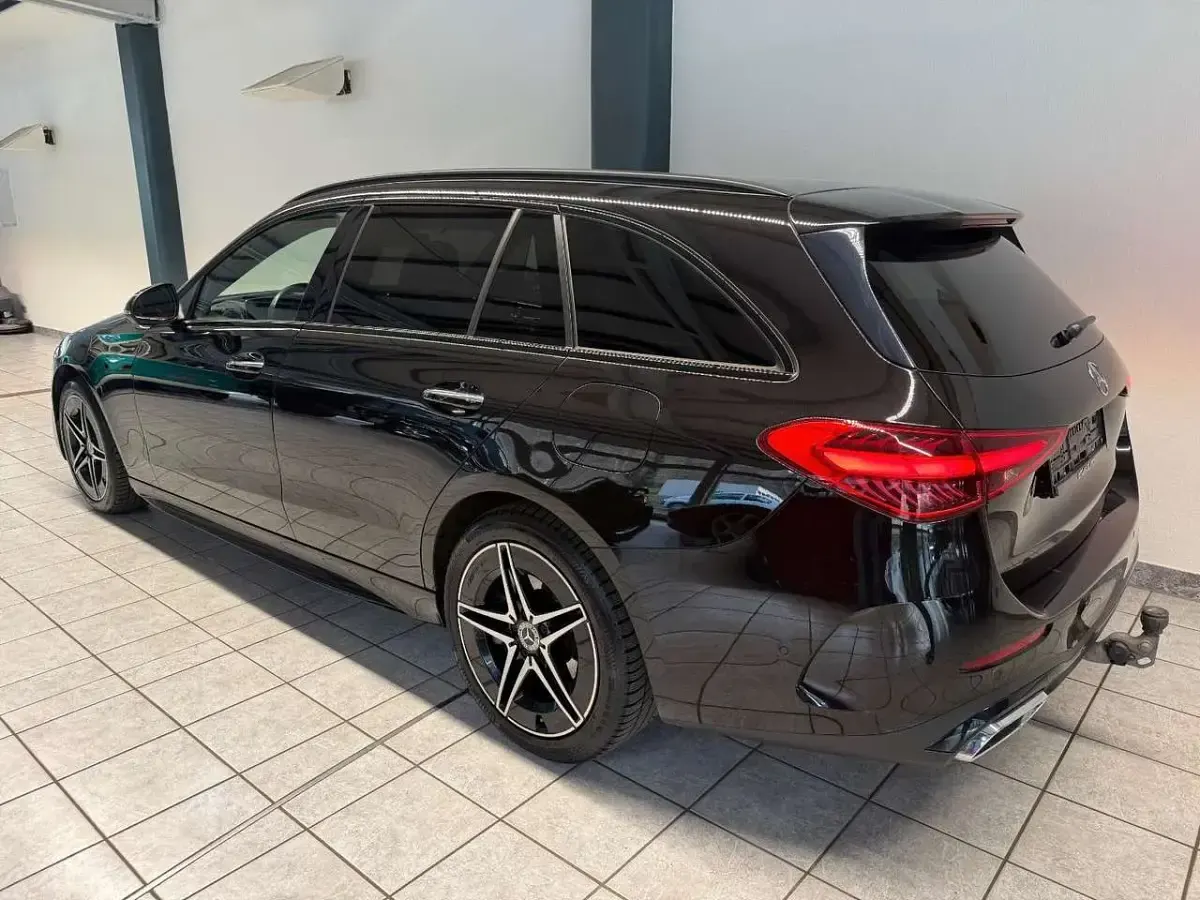 Gebraucht Mercedes C300e AMG line 204 PS (150 kW) 2022 Obsidianschwarz Kombi