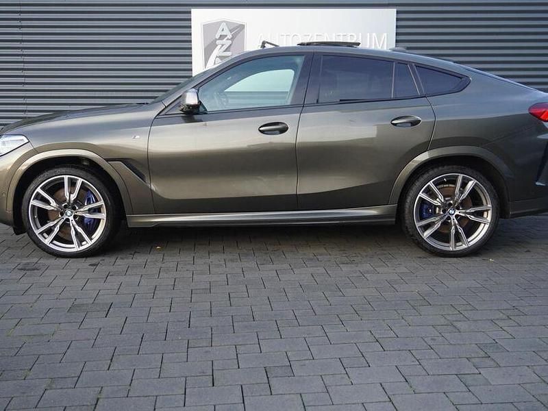 Gebraucht BMW X6 M50 Shadowline 400 PS (294 kW) 2020 Manhattan metallic SUV