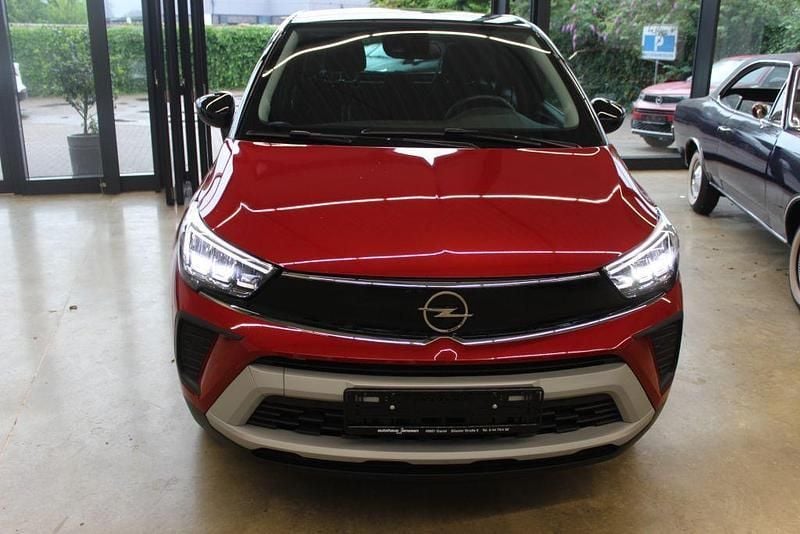 Kardio rot metallic Gebraucht 2024 Opel Crossland Elegance SUV | 20.690 € (Fairer Preis) - Bild 1/4