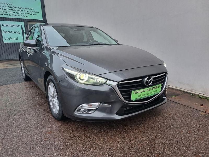 Grau Gebraucht 2017 Mazda 3 Exclusive-Line Limousine | 14.450 € (Etwas zu teuer) - Bild 1/3