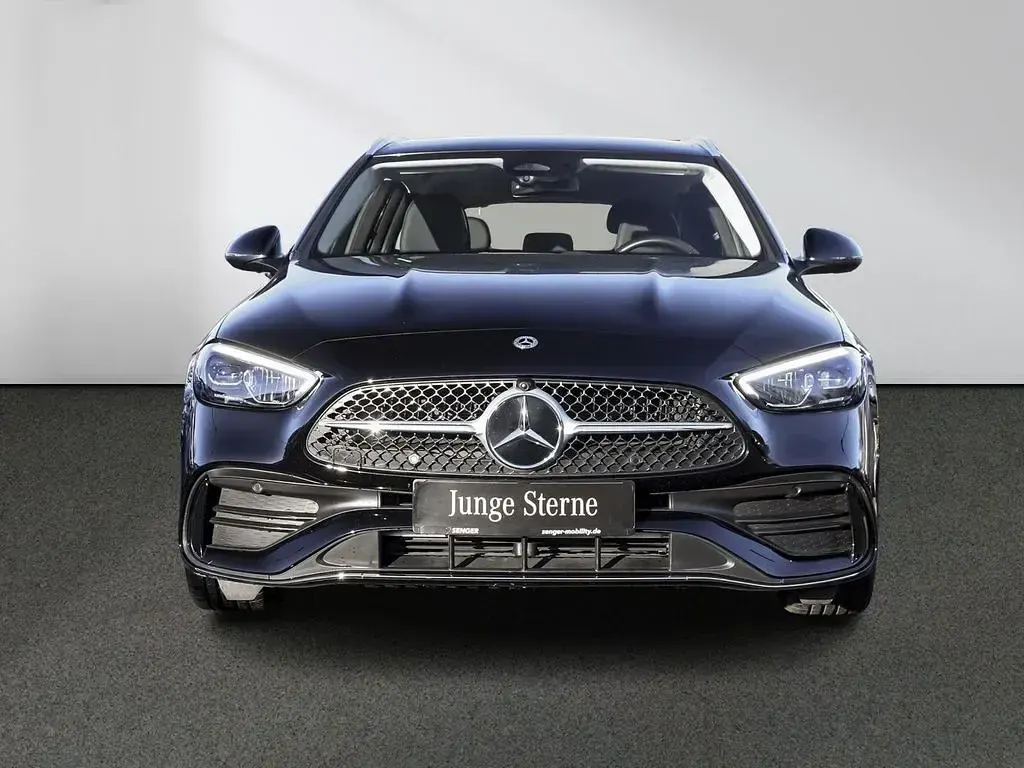 Gebraucht Mercedes C180 AMG 170 PS (125 kW) 2023 Unilack schwarz Kombi