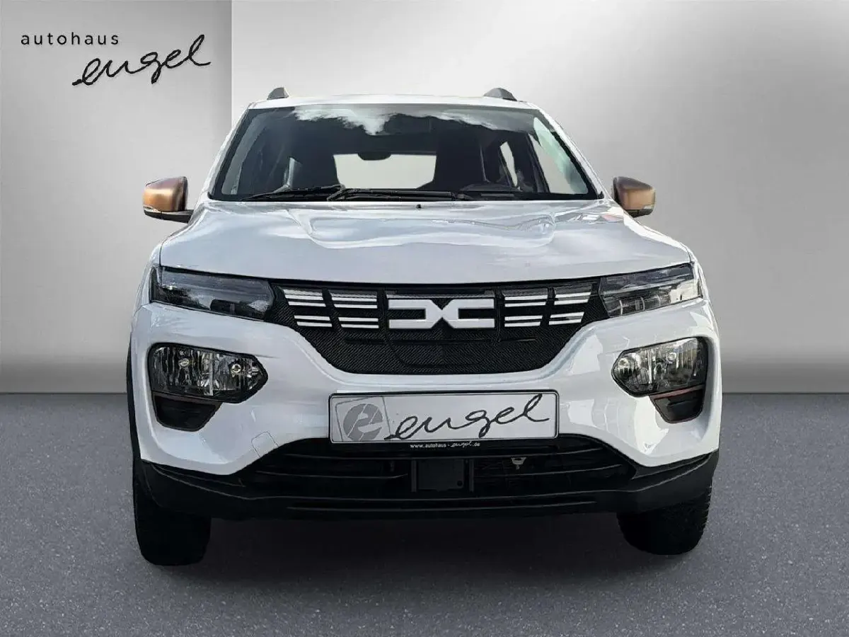 Gebraucht Dacia Spring Extreme 47 kW (65 PS) 2023 Polarweiss Kleinwagen