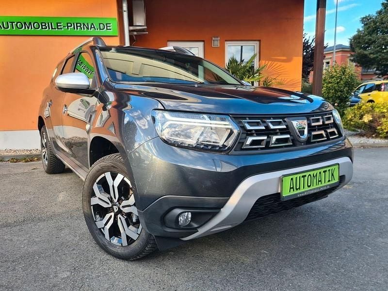 Cometen grau (metallic) Gebraucht 2021 Dacia Duster Prestige SUV | 18.950 € (Fairer Preis) - Bild 1/4