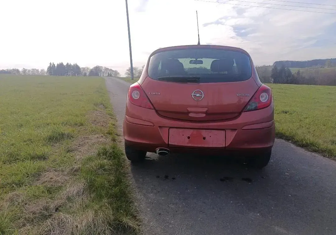 Gebraucht Opel Corsa Satellite 87 PS (63 kW) 2012 Orange Kleinwagen
