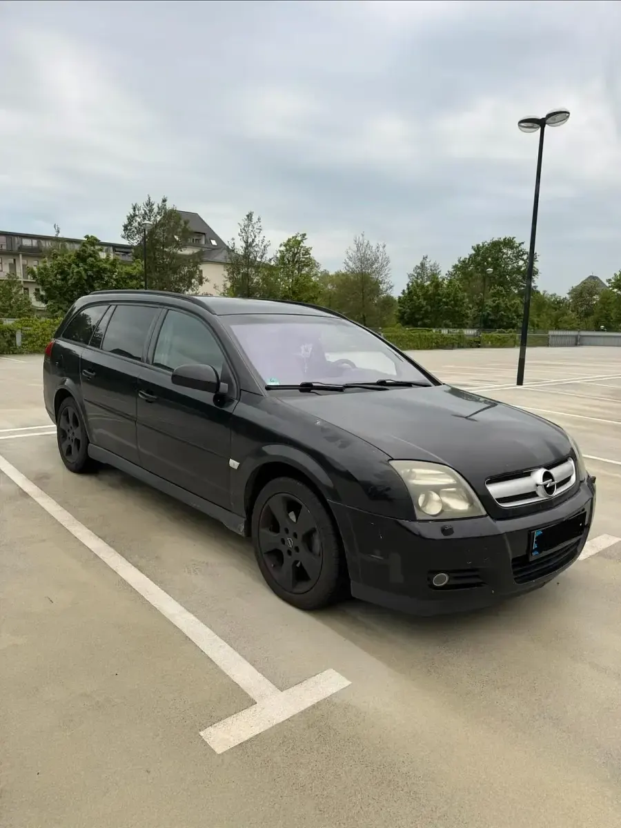 Używany Opel Vectra 120 KM (88 kW) 2004 Czarny Kombi