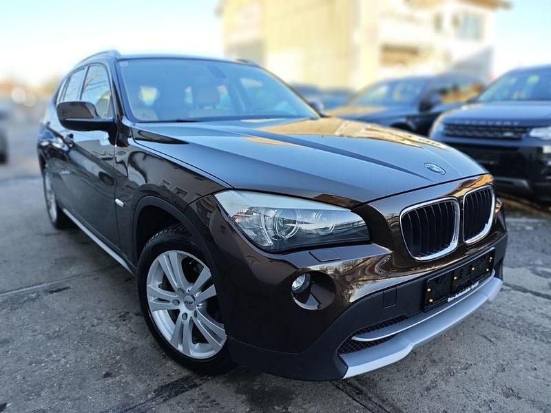 Braun Gebraucht 2011 BMW X1 Performance SUV | 6.900 € (Guter Preis) - Bild 1/4
