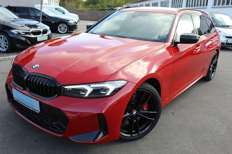 Melbournerot metallic Gebraucht 2023 BMW 330 M Sport Kombi | 41.980 € (Guter Preis) - Bild 1/4
