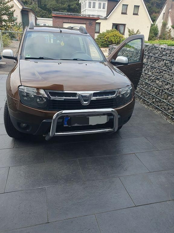 Braun Gebraucht 2013 Dacia Duster SUV | 5.900 € (Fairer Preis) - Bild 1/4