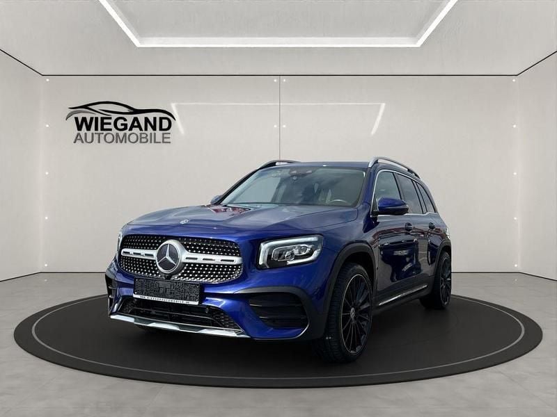 Galaxyblue metallic paint Gebraucht 2021 Mercedes GLB220 AMG line SUV | 26.690 € (Guter Preis) - Bild 1/4