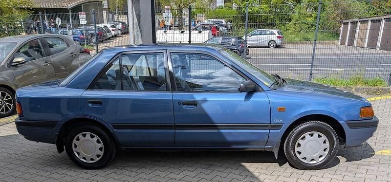 Second-hand Mazda 323 84 CP (61 kW) 1991 Albastru Berlinǎ