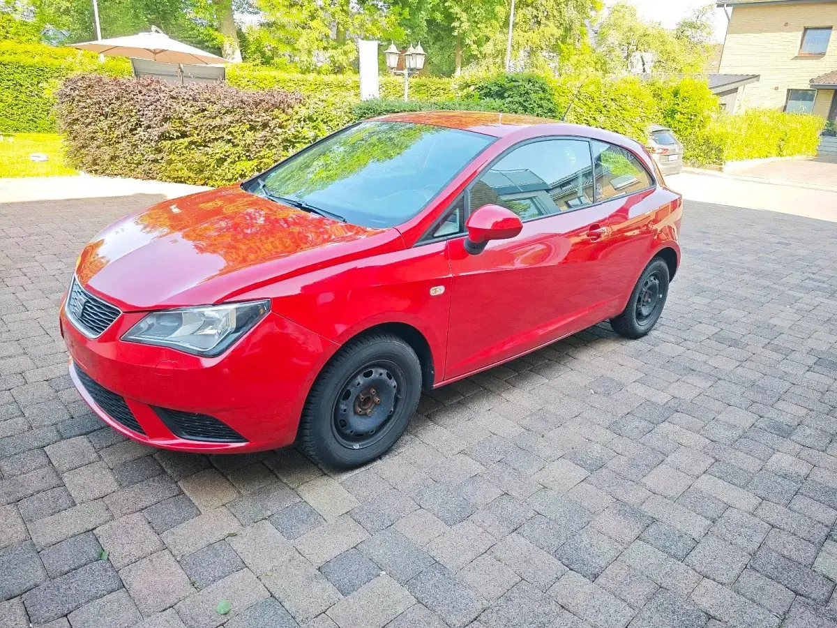 Używany Seat Ibiza 70 KM (51 kW) 2014 Czerwony Hatchback