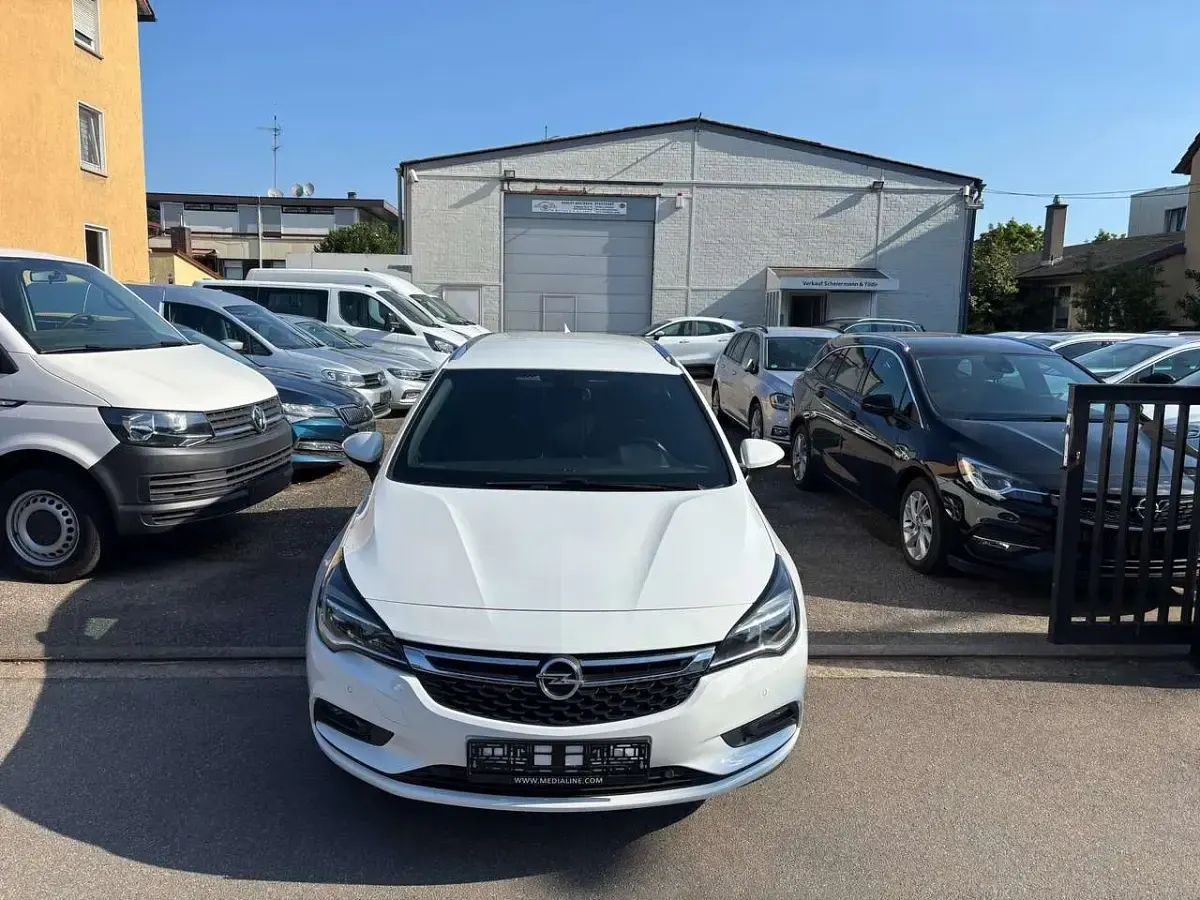 Gebraucht Opel Astra Dynamic 136 PS (100 kW) 2017 Schneeweiss/summitwhite/arctic Kombi