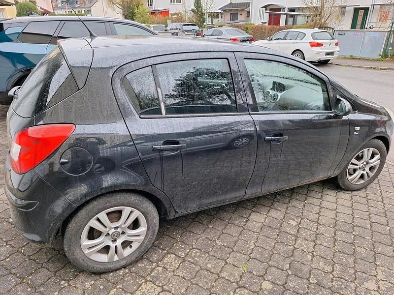 Gebraucht Opel Corsa Edition 101 PS (74 kW) 2013 Schwarz Kleinwagen