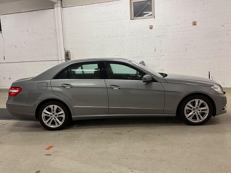 Second-hand Mercedes E200 184 CP (135 kW) 2010 Argintiu Berlinǎ