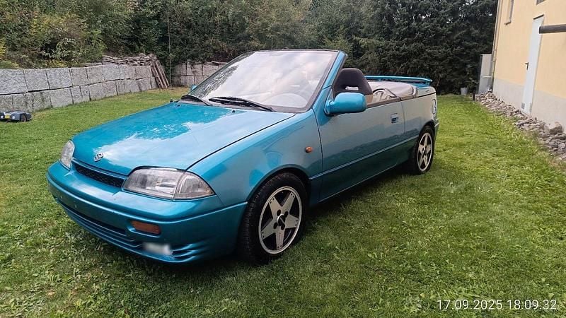 Second-hand Suzuki Swift 68 CP (50 kW) 1993 Albastru Cabrio