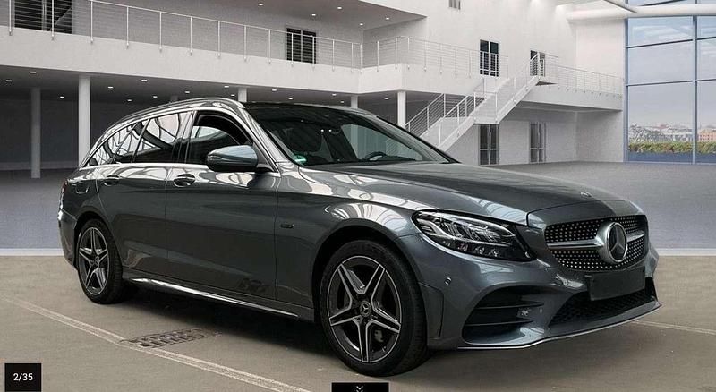 Grau Gebraucht 2021 Mercedes C300e AMG Kombi | 22.890 € (Superpreis) - Bild 1/3