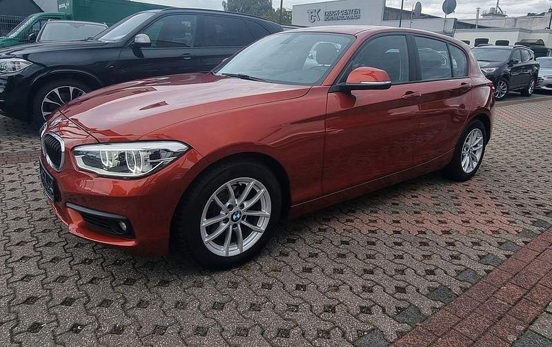 Orange Gebraucht 2018 BMW 118 Advantage Kleinwagen | 15.998 € (Guter Preis) - Bild 1/4