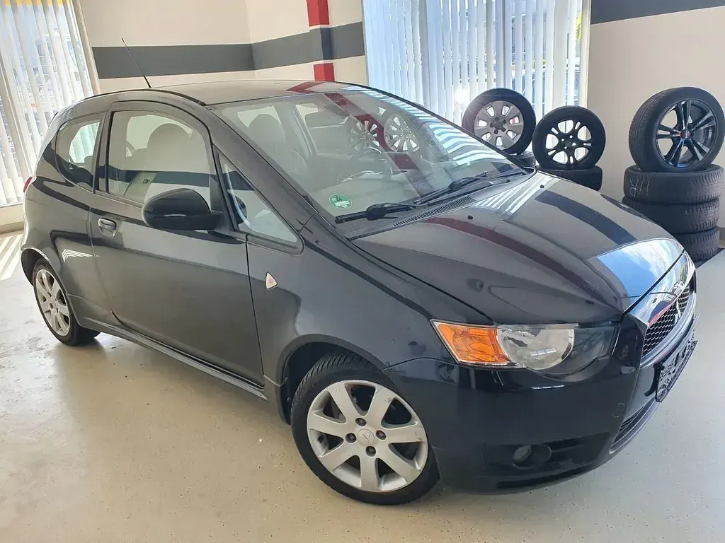 Gebraucht Mitsubishi Colt 95 PS (69 kW) 2012 Schwarz Kleinwagen