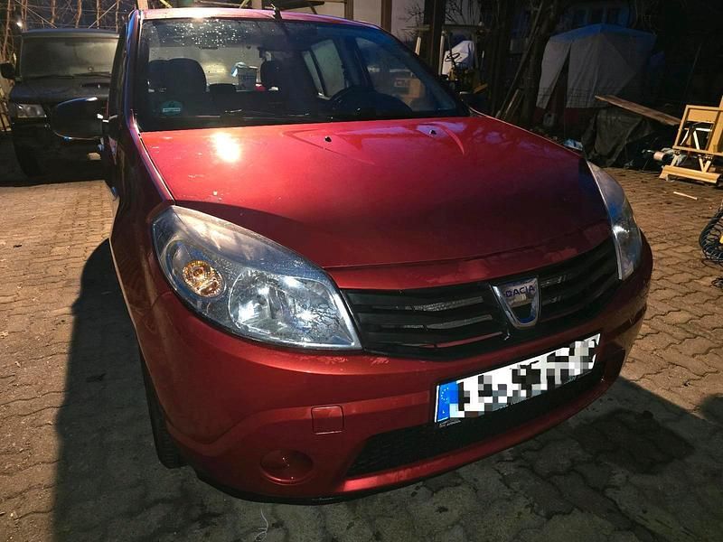 Gebraucht Dacia Sandero 70 PS (51 kW) 2011 Rot Kleinwagen
