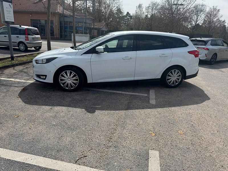 Second-hand Ford Focus Titanium 150 CP (110 kW) 2015 Alb Break