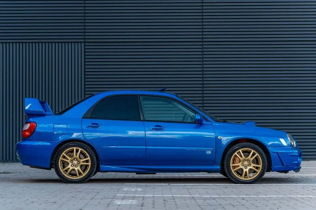 Gebraucht Subaru Impreza 280 PS (205 kW) 2001 Blau Limousine