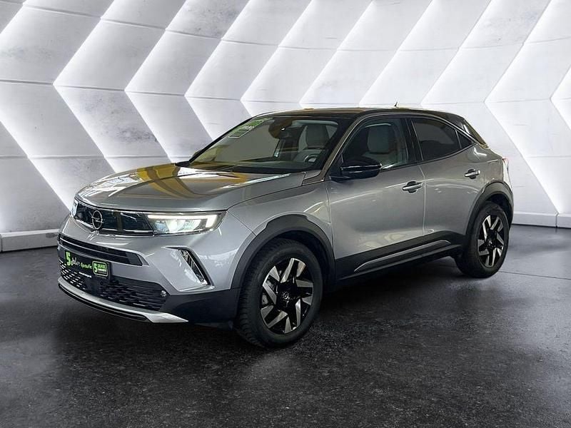 Gebraucht Opel Mokka-e Elegance 100 kW (136 PS) 2022 Kontrast grau/quarz silber SUV