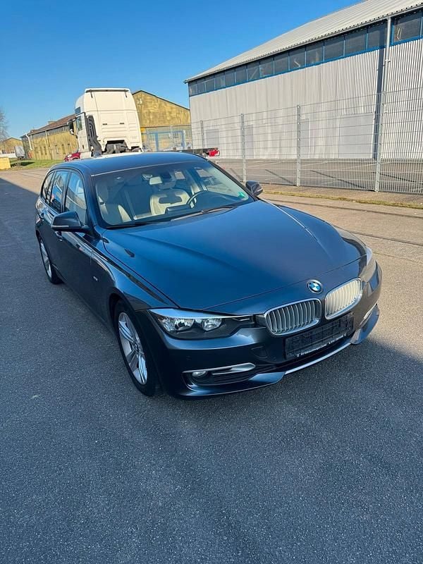 Gebraucht BMW 320 163 PS (119 kW) 2014 Grau Kombi
