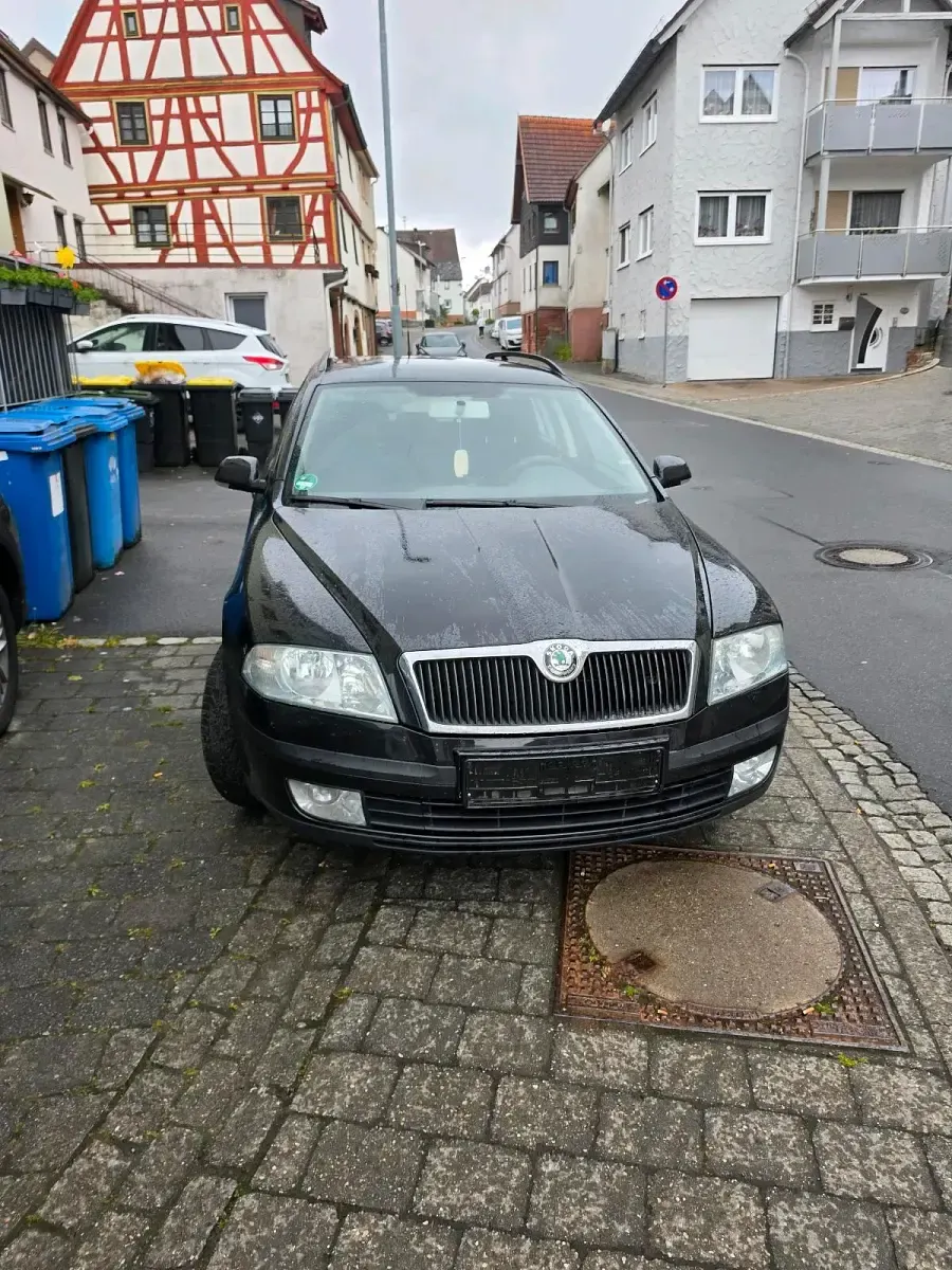 Używany Skoda Octavia 105 KM (77 kW) 2006 Czarny Sedan/Limuzyna