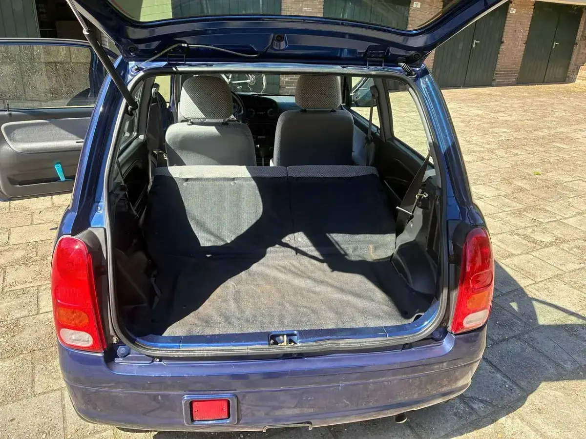 Gebraucht Daihatsu Cuore 56 PS (41 kW) 1999 Blau Kleinwagen