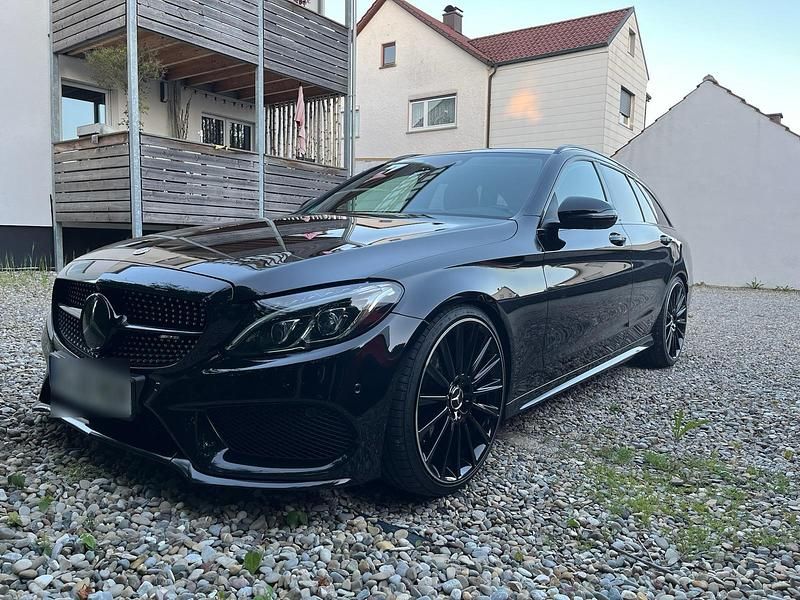 Schwarz Gebraucht 2015 Mercedes C250 AMG line Kombi | 22.650 € (Teuer) - Bild 1/4