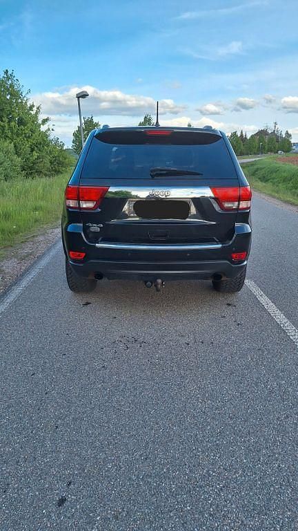 Schwarz Gebraucht 2012 Jeep Grand Cherokee Overland SUV | 9.000 € (Superpreis) - Bild 1/4
