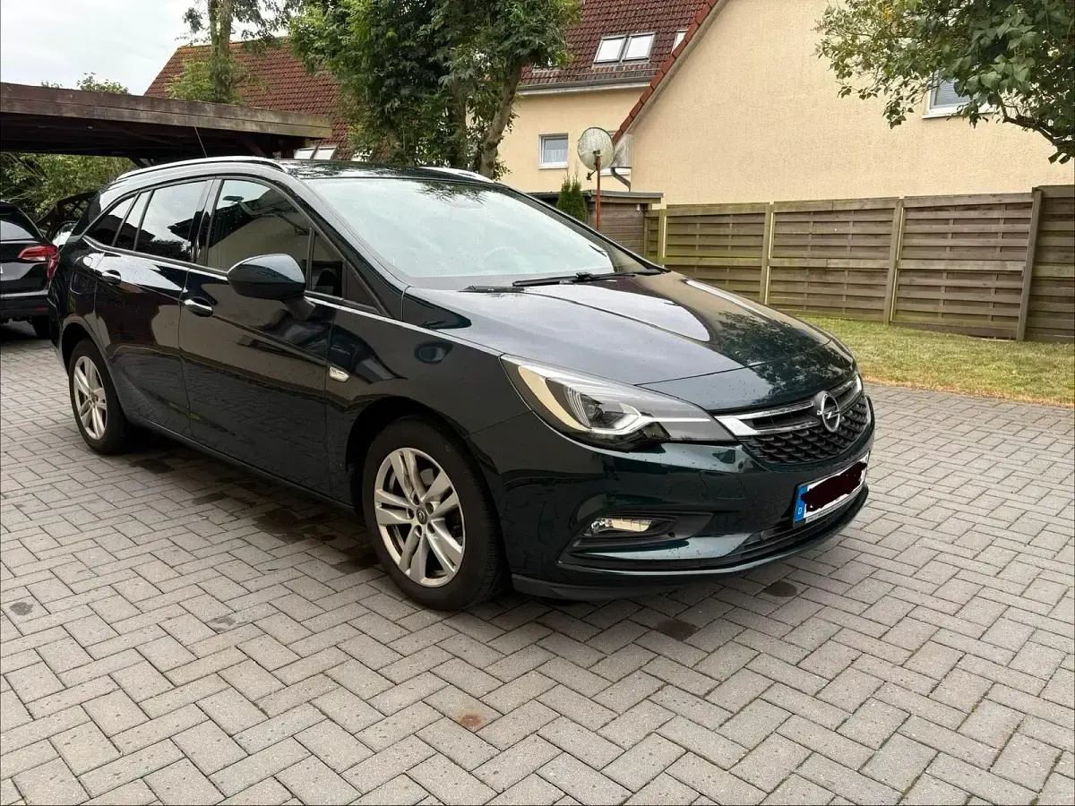 Gebraucht Opel Astra Active 125 PS (91 kW) 2017 Grün Kombi