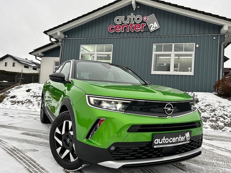 Grün Gebraucht 2022 Opel Mokka-e Elegance SUV | 16.980 € (Guter Preis) - Bild 1/4