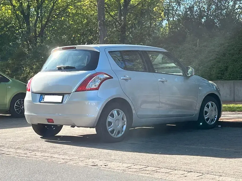 Second-hand Suzuki Swift 94 CP (69 kW) 2013 Gri Hatchback