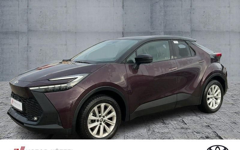 Dunkelamethyst metallic/ dach Gebraucht 2024 Toyota C-HR Team SUV | 35.490 € - Bild 1/4