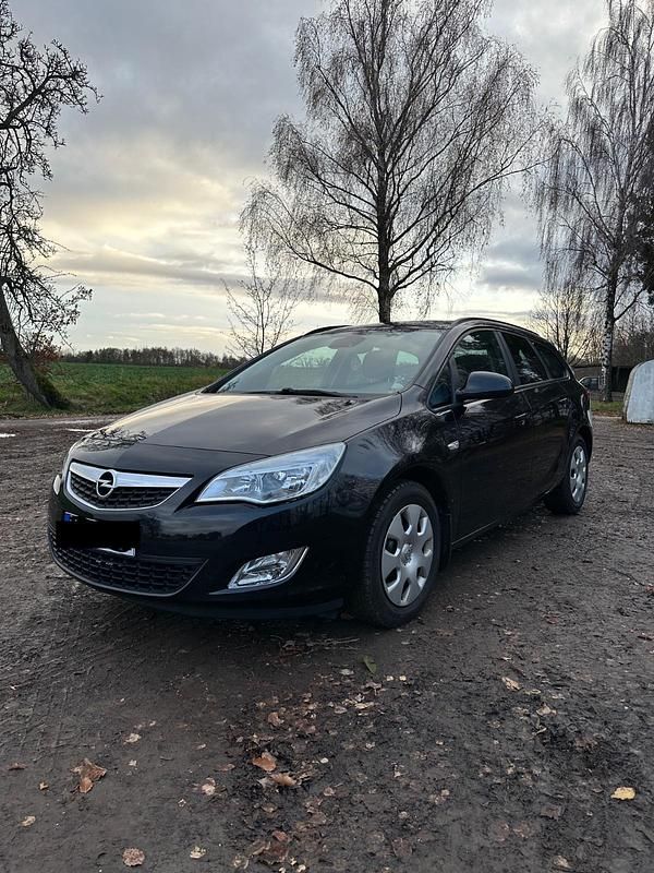Schwarz Gebraucht 2011 Opel Astra Kombi | 6.990 € - Bild 1/4