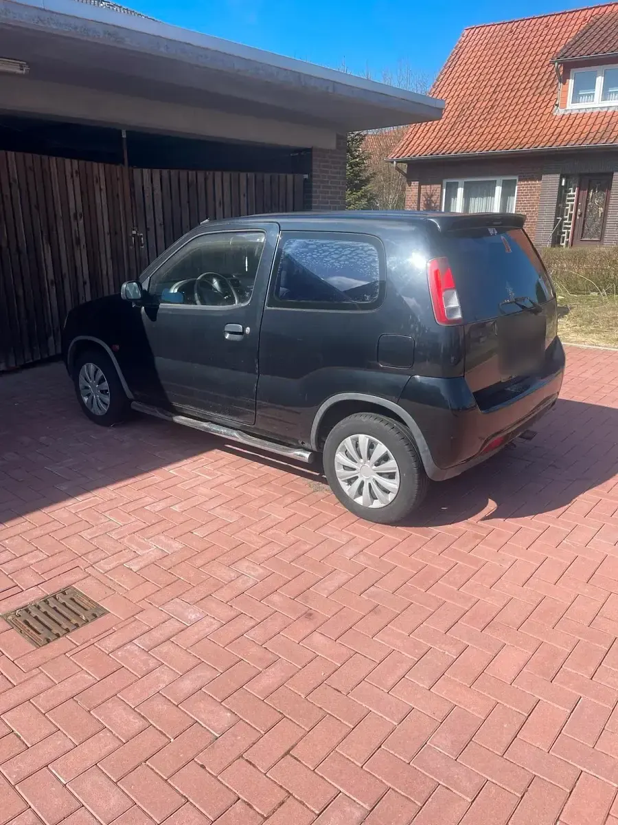 Gebraucht Suzuki Ignis 83 PS (61 kW) 2001 Schwarz Kleinwagen