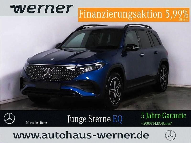 Lack spektralblau (metallic) Gebraucht 2024 Mercedes EQB300 AMG Line Premium SUV | 41.641 € (Fairer Preis) - Bild 1/4