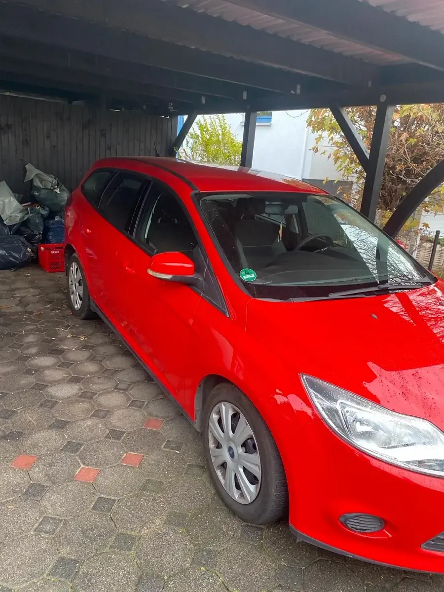 Używany Ford Focus 150 KM (110 kW) 2013 Czerwony Kombi