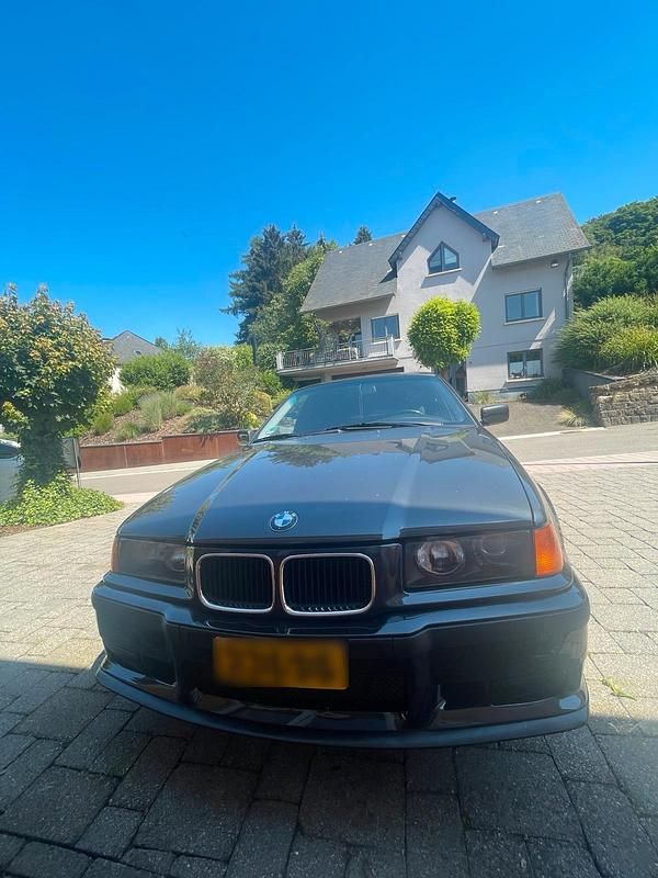 Gebraucht BMW 320 150 PS (110 kW) 1991 Schwarz Limousine