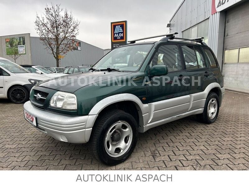 Grün Gebraucht 1998 Suzuki Grand Vitara Limited SUV | 4.400 € (Etwas zu teuer) - Bild 1/4