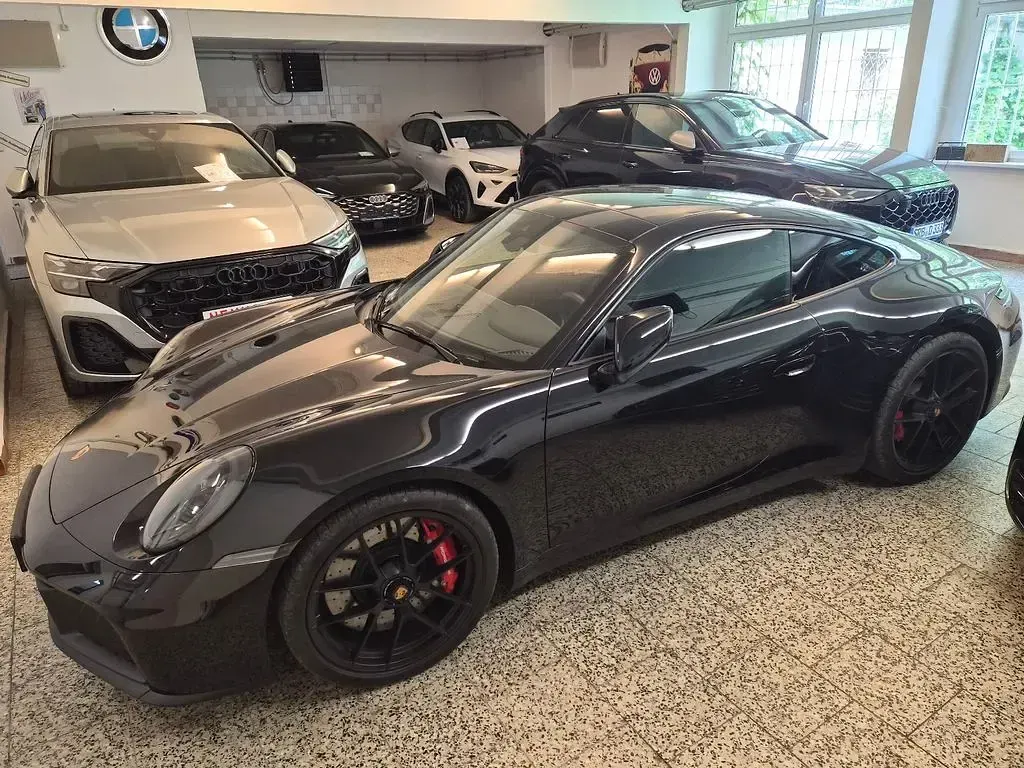 Gebraucht Porsche 911 485 PS (356 kW) 2025 Tiefschwarzmetallic Coupé