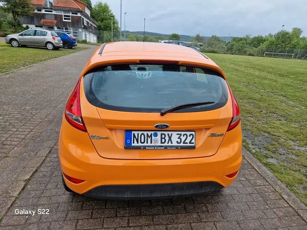 Gebraucht Ford Fiesta Titanium 95 PS (69 kW) 2011 Orange Limousine